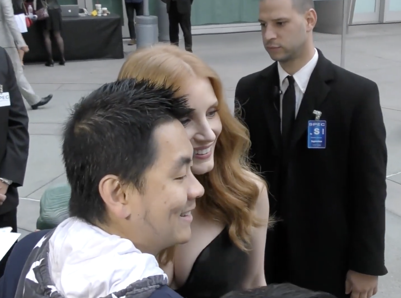 Jessica Chastain signing autograph and fan selfie